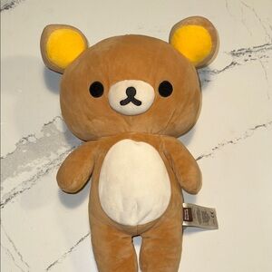 Charming Brown and Yellow Stuffed Bear by [Brand]